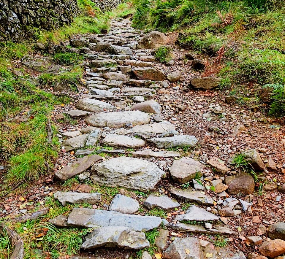 An uphill rocky path.